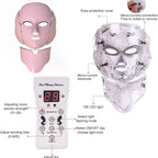 LED face mask with control panel and labeled features on a white background