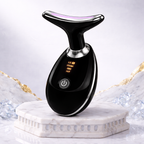 Black handheld device with digital display on a marble base