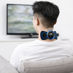 Person using a neck massager device in a living room setting.